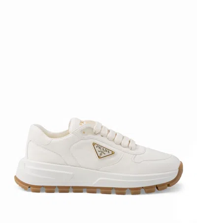 PRADA LEATHER TRIANGLE SNEAKERS