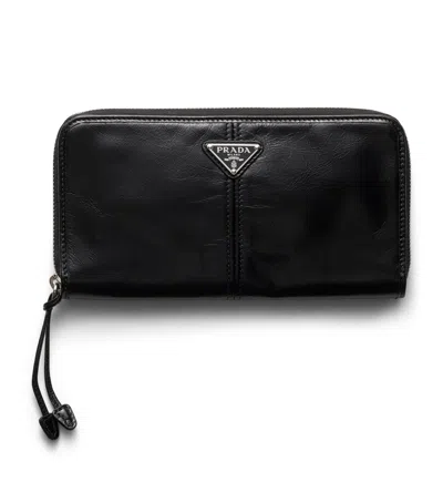 Prada Leather Zip-around Wallet In Black