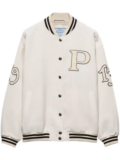 Prada Letter-patch Appliqué Bomber Jacket In Neutrals