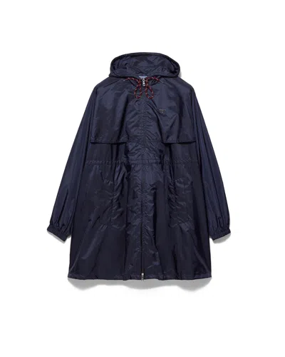 Prada Lightweight Re-nylon Hooded Raincoat In Blue