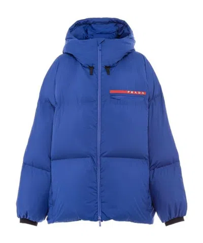 Prada Oversized Technical Nylon Down Jacket In Indigo Blue