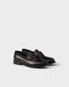 Prada Leather Ruched Penny Loafers In Brown