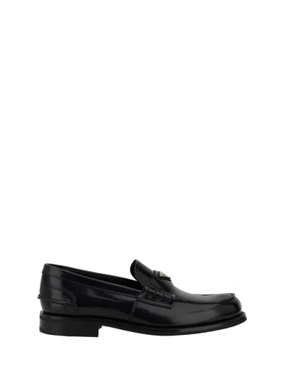 Prada Triangular Plaque Loafers In Black