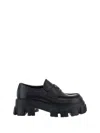 Prada Monolith Lug Sole Loafer In Black