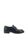 Prada Triangle Logo Brushed Leather Loafers In Nero