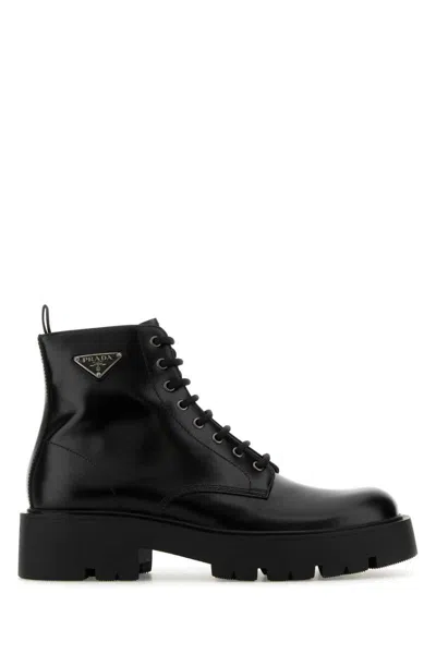 Prada Logo-plaque Panelled Ankle Boots In Black