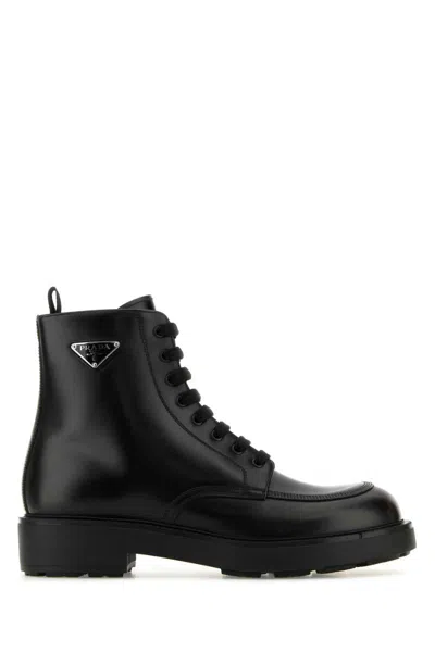 Prada Logo-plaque Panelled Ankle Boots In Black