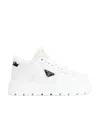 Prada Leather Shearling Lug-sole Sneakers In White