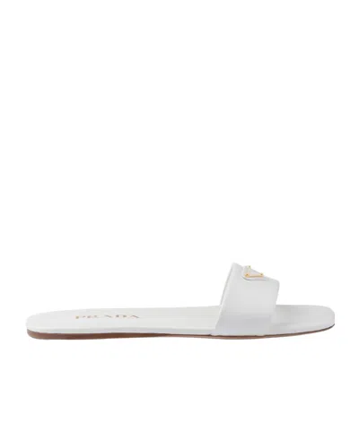 Prada Calfskin Logo Flat Slide Sandals In White