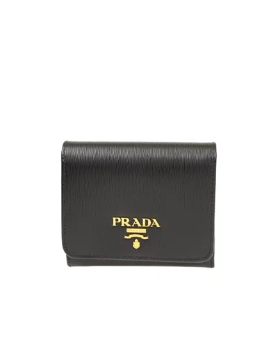 Prada Logo Embossed Wallet In Black