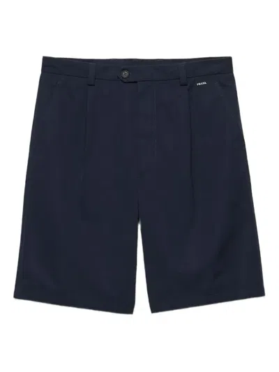 Prada Logo-embroidered Front-pleated Shorts In Blue