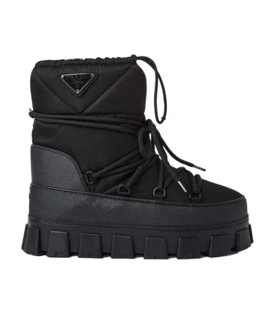 Prada Logo Lac-up Booties In Black