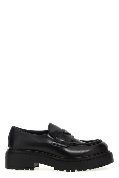 Prada Monolith Leather Loafers In Black