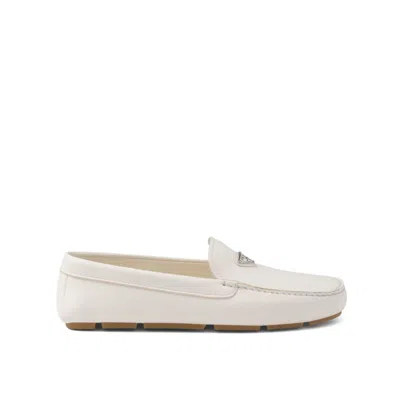 PRADA LOGO LEATHER LOAFERS