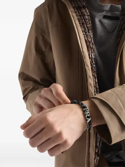 Prada Logo-lettering Cord Bracelet In Brown