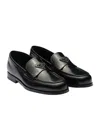Prada Triangular Plaque Loafers In Black