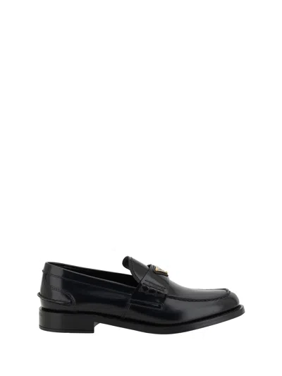 Prada Leather Loafers With Decorative Buckle And Round Toe In Black