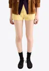 Prada Logo Patch Double Mini Shorts In Yellow