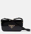 Prada Logo Patent Leather Shoulder Bag In Black