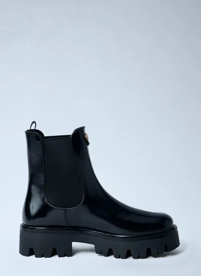 PRADA LOGO PLAQUE ANKLE BOOTS