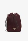 Prada Logo-plaque Bucket Bag In Red