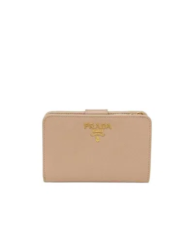 Prada Logo-plaque Foldover Wallet In Nude