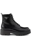 PRADA LOGO PLAQUE LEATHER COMBAT BOOTS