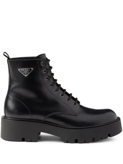 Prada Logo-plaque Panelled Ankle Boots In Black