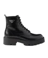 Prada Brushed Leather Ankle Boot For Men In Black