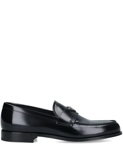 PRADA LOGO-PLAQUE LEATHER LOAFERS