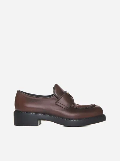 Prada Logo-plaque Leather Loafers In Brown