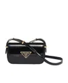 Prada Logo Patent Leather Shoulder Bag In Black