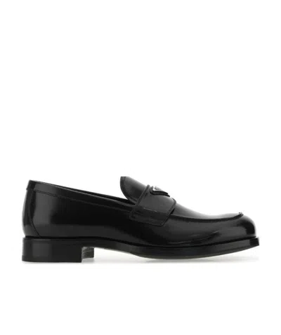 PRADA PRADA LOGO PLAQUE SLIP-ON LOAFERS