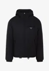 Prada Logo Plaque Puffer Jacket In Black
