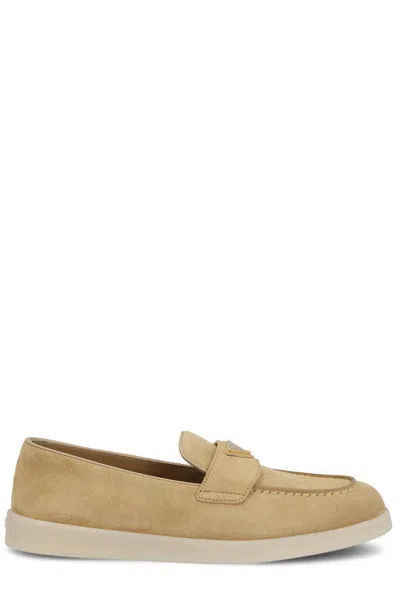 Prada Logo Plaque Slip-on Loafers In Beige