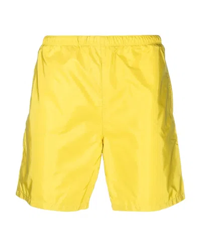 Prada Logo-plaque Swim Shorts In Yellow