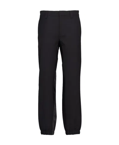 Prada Logo-plaque Tailored Trousers In Black
