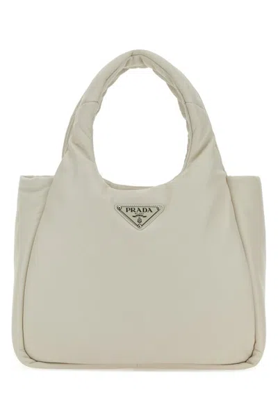 Prada Logo Plaque Top Handle Tote Bag In White