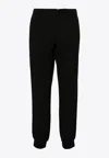Prada Logo Plaque Track Pants In Black