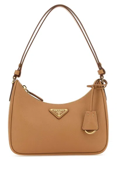 Prada Logo Plaque Zipped Shoulder Bag In Brown