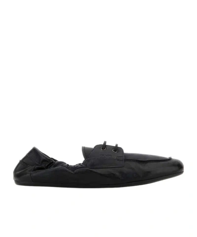 Prada Logo-printed Lace-up Boat Shoes In Black
