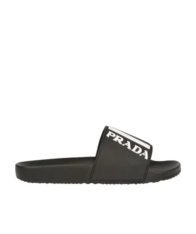 Prada Logo Slippers In Black