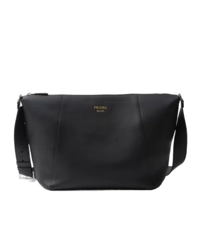 Prada Logo Print Leather Messenger Bag In Black