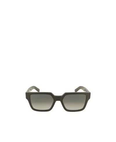 Prada Logo Sunglasses In Brown