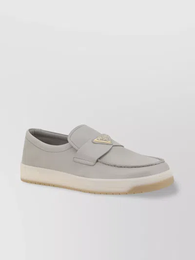 Prada Logoed Round Toe Leather Loafers In Gray
