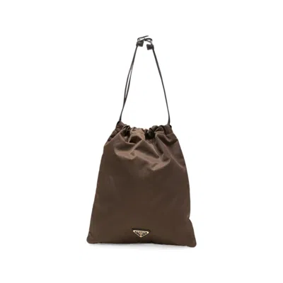 Prada Logo-plaque Drawstring Tote Bag In Brown