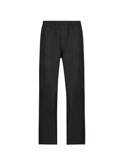 Prada Logo-plaque Trousers In Black