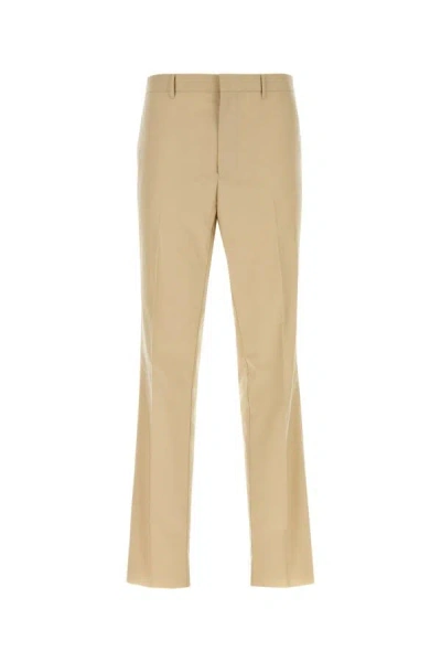 Prada Triangle-logo Tailored Cotton Trousers In Beige