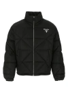 Prada Quilted High Collar Down Jacket In Black