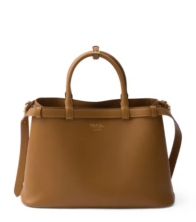 Prada Medium Leather Buckle Tote Bag In Brown